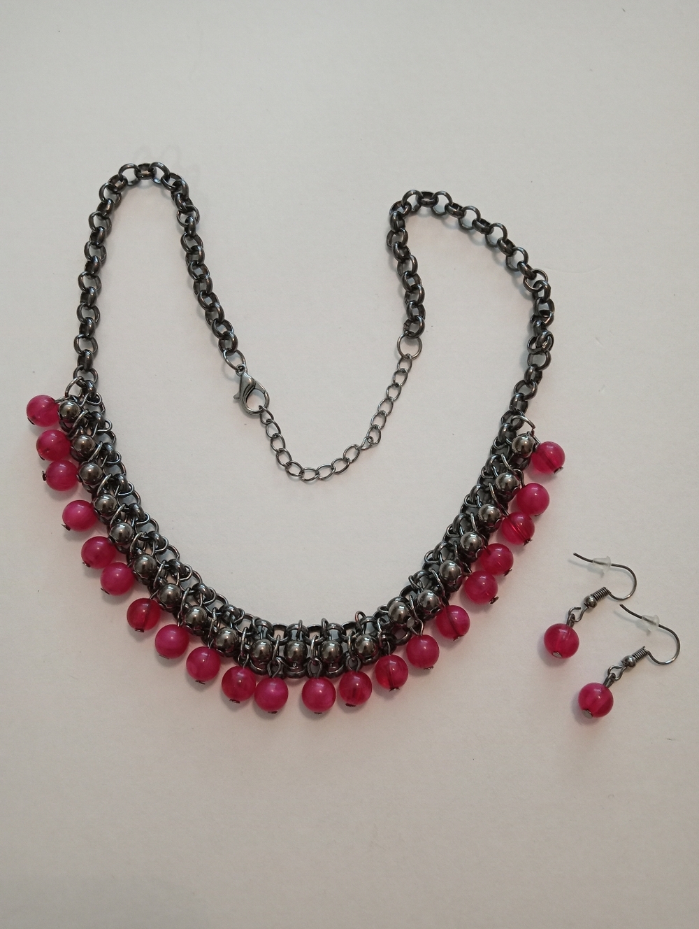 #1200.  Fuschia Pink Acrylic And Gunmetal Necklace And Earring Bundle